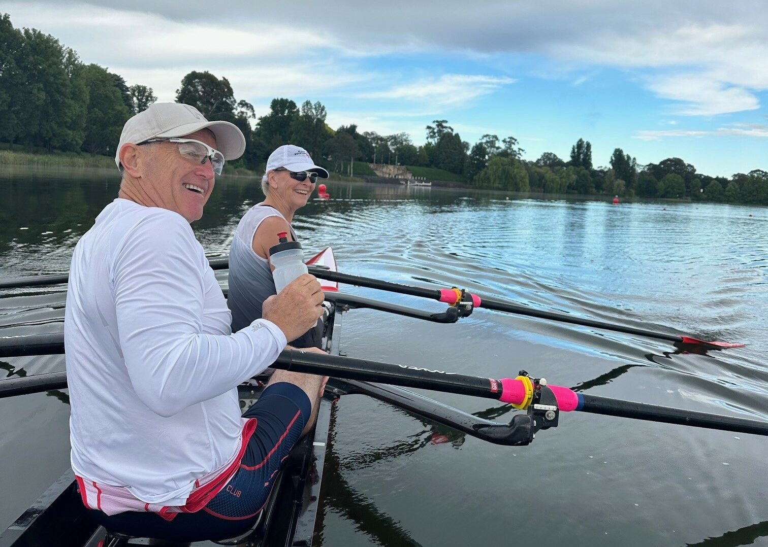 Founding donors John and Jeanette Gasson rowing on Lake Burley Griffin
